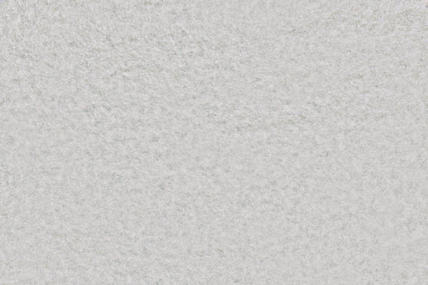 istock Texture of white foam material. Background felt of grey fabric with uniform pattern 1226927133