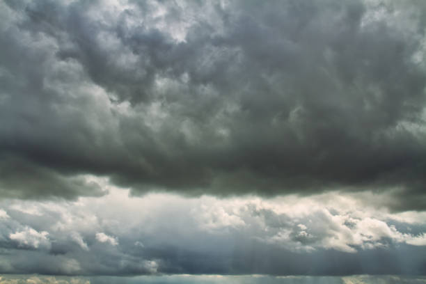 istock Cloudscape. Blue sky and grey clouds. Sunny day. Cumulus clouds. 1226927217