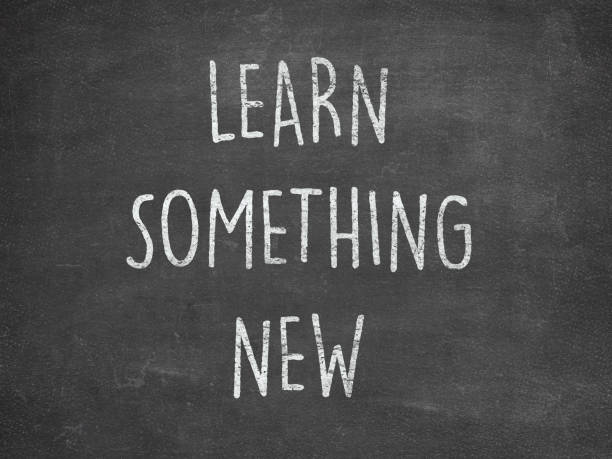 istock LEARN SOMETHİNG NEW , handwritten lettering quote ON BLACKBOARD. 1226928709