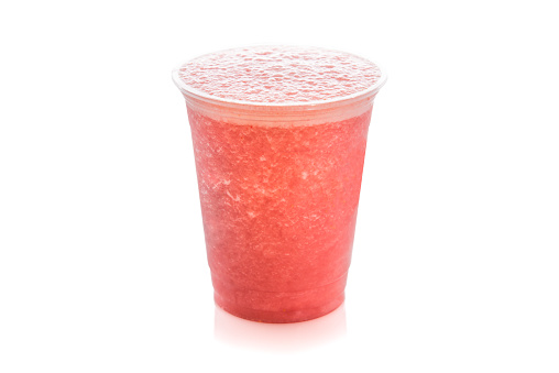 Watermelon smoothie in plastic cup isolated on white background.