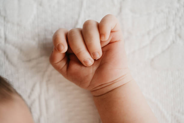 istock Newborn little hand detail 1226930789