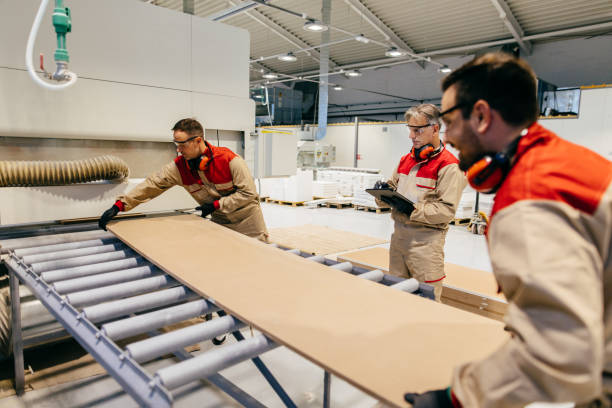istock Senior manager supervising carpenters during their work in a workshop 1226930938