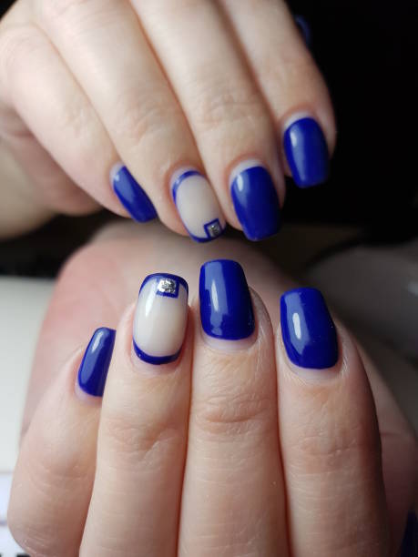 istock Beautiful woman's nails with beautiful manicure. Manicure work. 1226932289