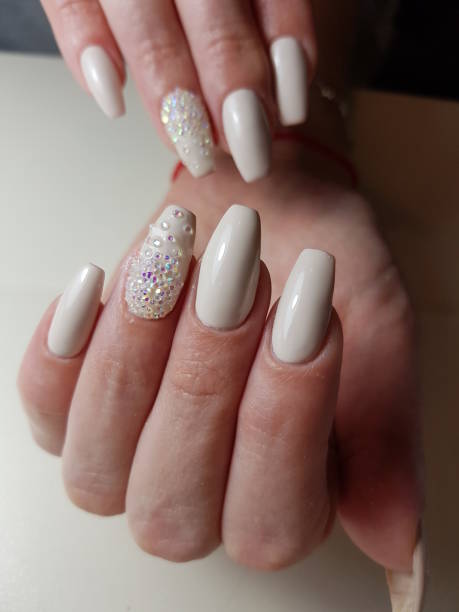 istock Beautiful woman's nails with beautiful manicure. Manicure work. 1226932297