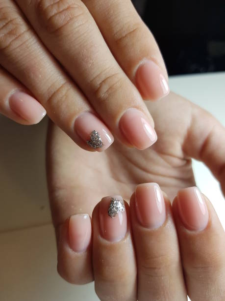 istock Beautiful woman's nails with beautiful manicure. Manicure work. 1226932317
