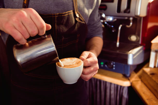 istock Coffee Latte Barista making pattern in a cup of coffee shop. 1226934744