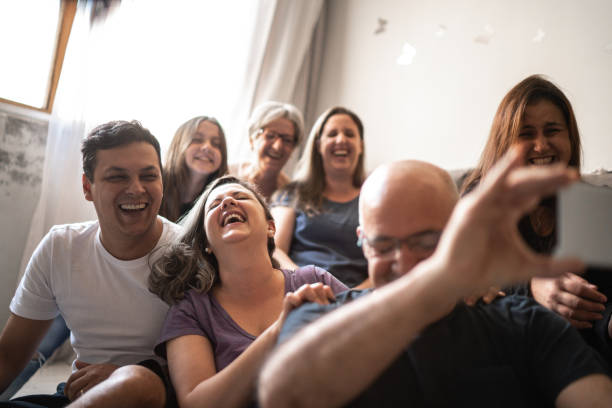 istock Happy family doing video call at home 1226934770