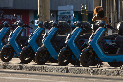 Madrid, Spain - May 19, 2020: Electric motorcycle of the shared system transport service from the Movo company, parked in O'donell street.