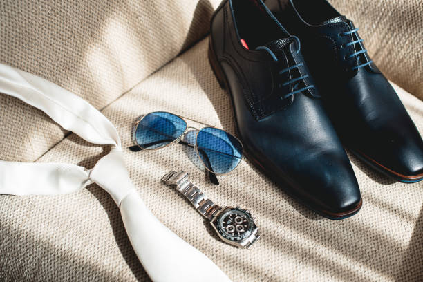 istock Wedding details. Classic groom accessories. natural sunlight 1226935110