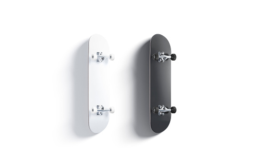 Blank black and white wood skateboard mockup set, back side, 3d rendering. Empty longboard bottom panel with wheels mock up, top view, isolaled. Clear extremal teenager sport mokcup template.