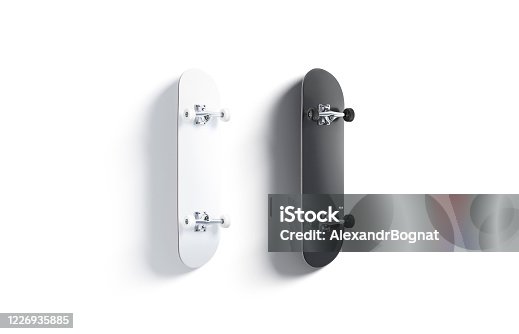 istock Blank black and white wood skateboard mockup set, back side 1226935885