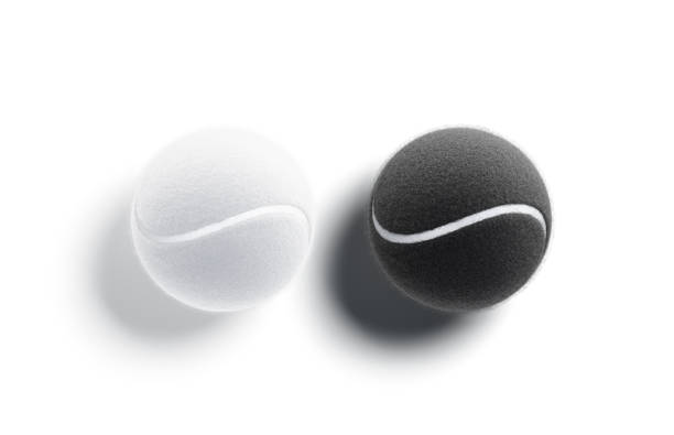 Close up of tennis balls in a basket.