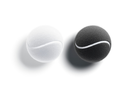 Blank black and white tennis ball mock up set, top view, 3d rendering. Empty sporty circle matchball mockup, isolated. Clear fuzz textured equipment for tenis match mokcup template.