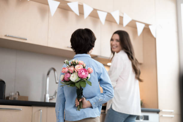 istock Smiling pleased mother looking at her son 1226938487
