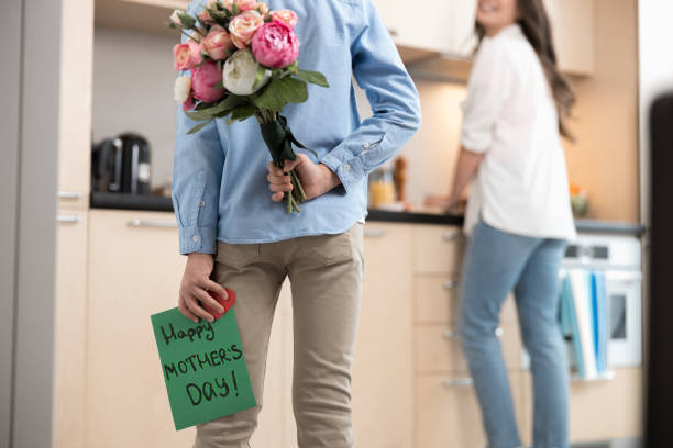 istock Caucasian young woman smiling at a boy 1226938495