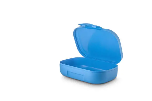 Open empty plastic blue lunchbox on a white background. Blank for design. Copy space. Isolated