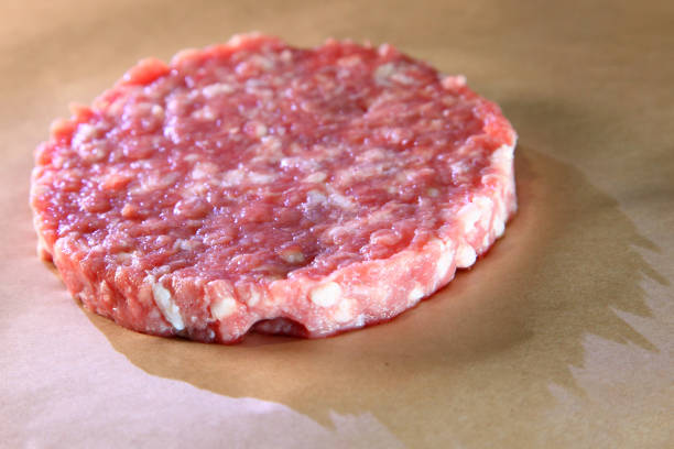 istock Raw cutlet for a juicy burger. 1226941061