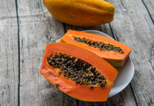 istock Sweet papaya with fresh fruit and red heart 1226941285