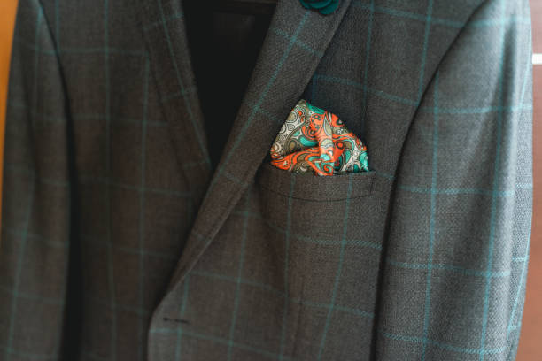 fragment of expensive man's suit jacket in plaid pattern - clothing label sewing label label window imagens e fotografias de stock
