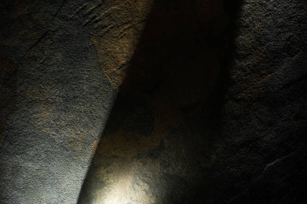 istock light prism with beams on dark stone texture background 1226942902