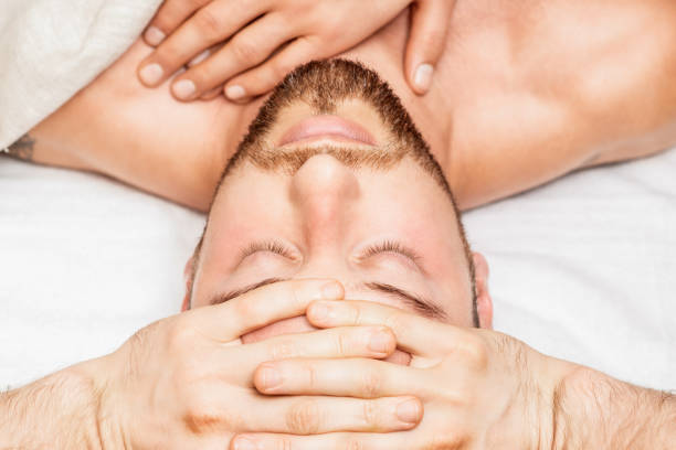 istock Head massage of young man. 1226943222