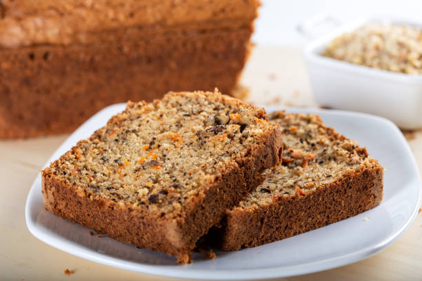 istock Sweet walnut carrot cake on white background 1226944752