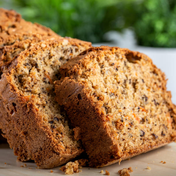 istock Sweet walnut carrot cake on white background 1226944828