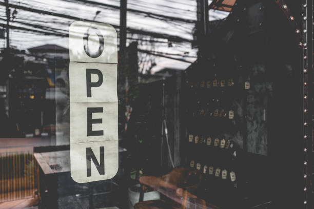 istock Come in we're open  in cafe owner open startup with cafe shop 1226944966