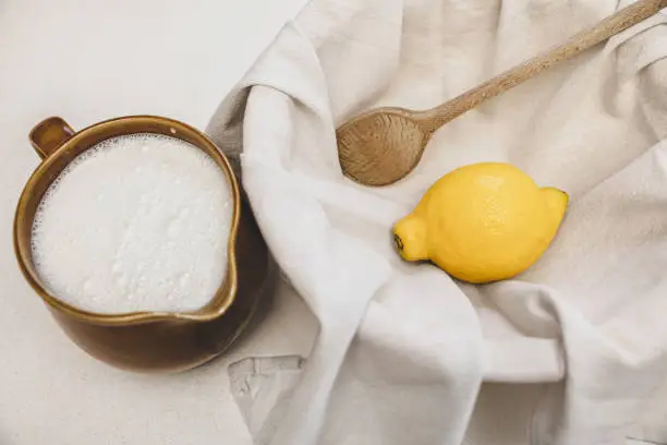 fresh cheese making recipe ingredients, milk, lemon and a cotton cloth, cheesemaking at home