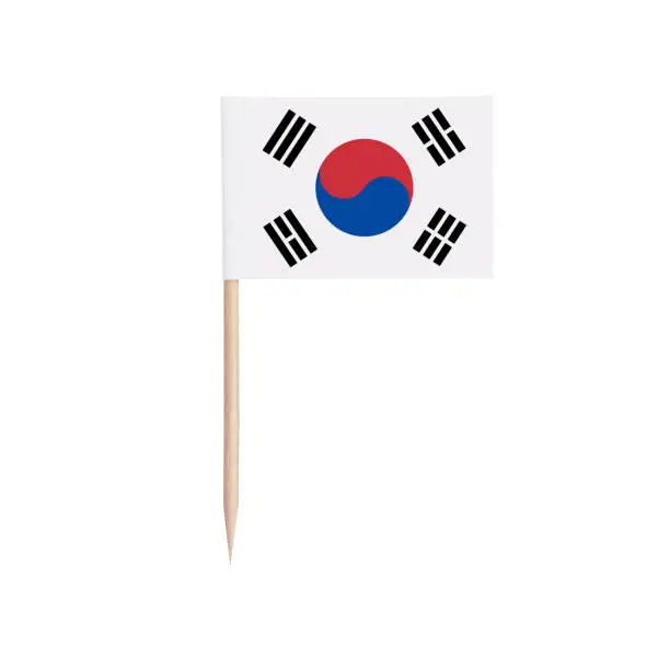 Miniature paper flag South-Korea. Isolated South Korean toothpick flag pointer on white background.