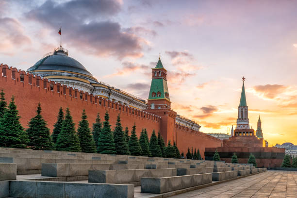 The wall of the Moscow Kremlin and the Mausoleum at sunset in the evening stock photo