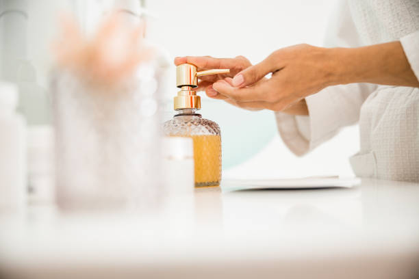 istock Woman taking soap for washing hands indoors 1226955777
