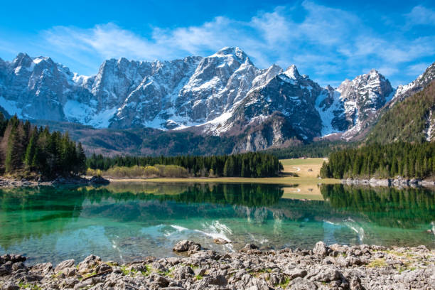 istock Spring morning at the alpine lake 1226957159