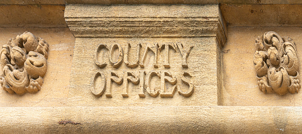 The carving above Oxford County Offices