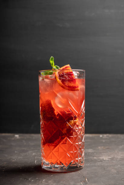 istock Red cocktail with blood oranges and mint on the rustic background 1226962260