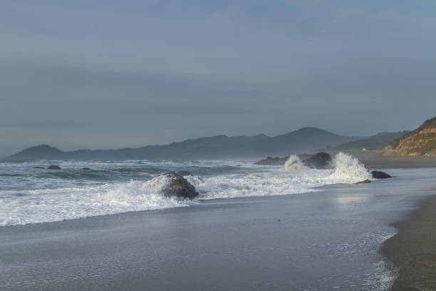 istock Powerful waves crashing on the rocks 1226963406