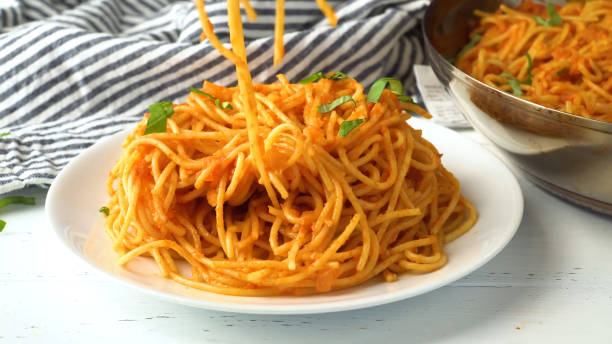 istock Pasta Closeup of process of making cooking Penne pasta 1226972818