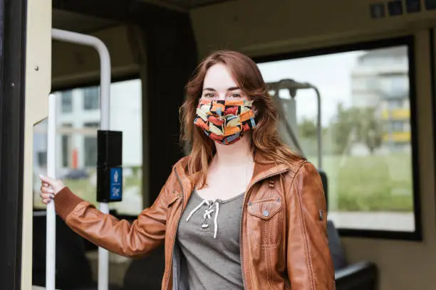 Woman wearing a mask in town during Covid19