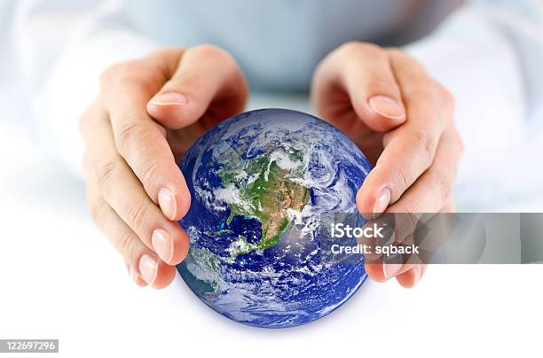 Protect The Earth Stock Photo - Download Image Now - Adult, Blue, Care