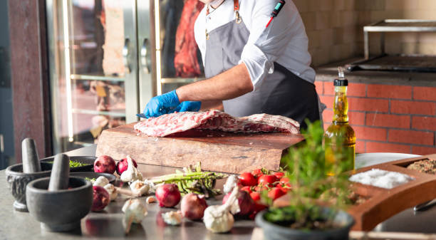 istock Chief preparing lamb rib meat for delicious dinner meal 1226979208