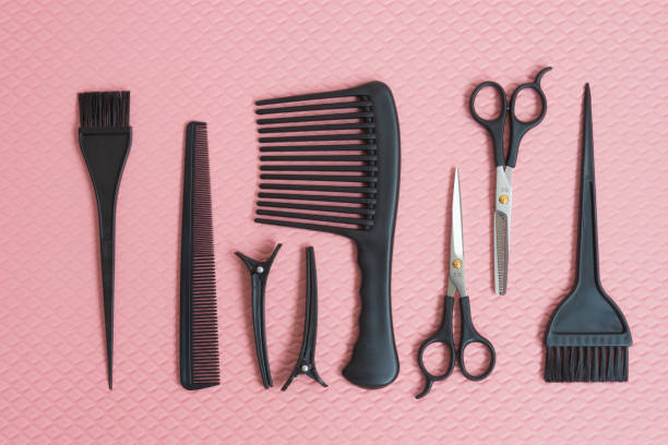 istock Barber accessories, laid out on a pink background. Postcard, background. 1226980038