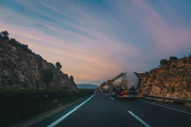 istock Driving at sunset on the highway 1226980277