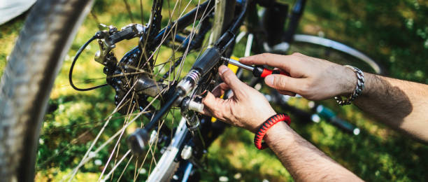 istock Man repairing bicycle DIY 1226980558