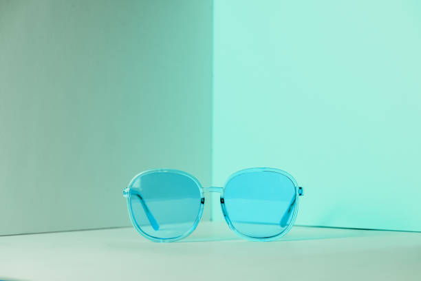 istock Stylish blue sunglasses on modern minimal pastel background, front view. Nobody. Product photograph 1226982107