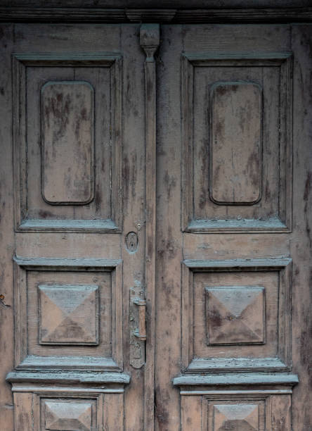 istock Old wooden doors are painted brown with colorless paint 1226983294