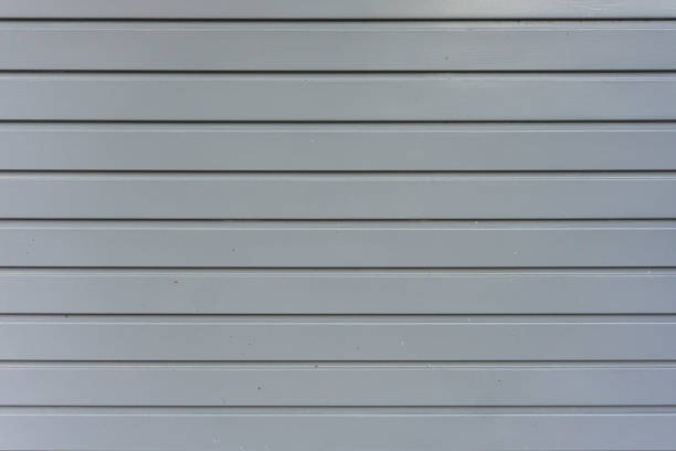 istock Metallic garage door texture. Simple horizontal stripes texture. Background. Close up. 1226983369