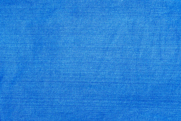 istock Light blue denim fabric photographed close up 1226983803