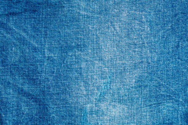 istock Light blue shabby jeans. Denim fabric. Aged in production 1226983805