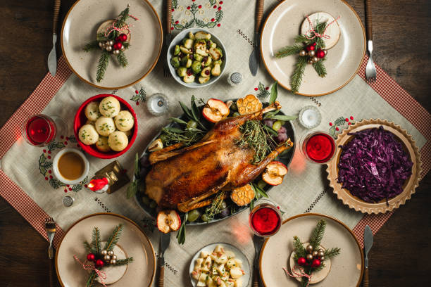 cena de navidad tradicional alemana - ánsar fotografías e imágenes de stock