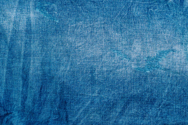 istock Light blue shabby jeans. Denim fabric. Aged in production 1226984106
